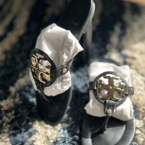 Tory Burch Black Sandals with Gold Accents